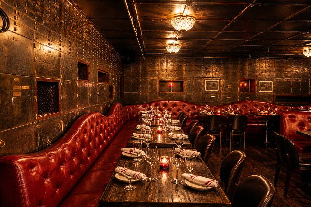 The vault dining room at Bueno set for evening service