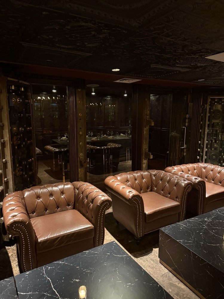 Leather armchairs and marble tables in the lounge
